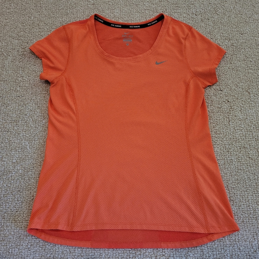 Nike Women’s Dry Fit Running Athletic Shirt Sz Medium 100% Polyester Orange.